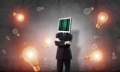 Businessman with monitor instead of head.