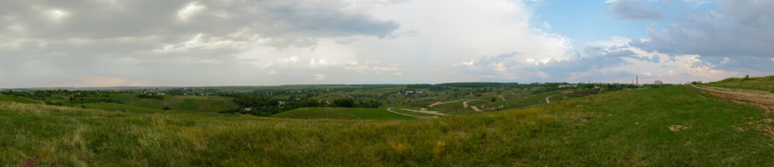 Fototapeta na wymiar panorama of hilly countryside