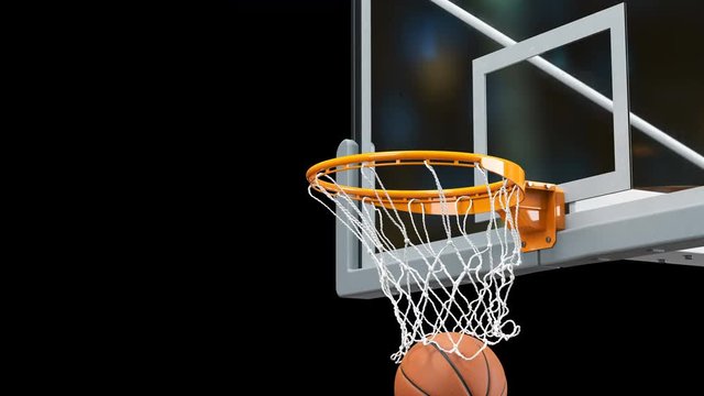 Beautiful Basketball Ball Hits Basket Net Slow Motion Close-up Camera Fly. Ball Flies Spinning into Basketball Hoop Black and Green Screen. Sport Concept. 3d Animation Alpha Matte 4k UHD 3840x2160.
