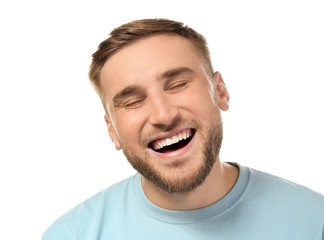 Obraz premium Handsome man with beautiful smile on white background