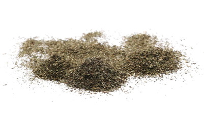 Pile of dried oregano spice, leaves isolated on white background