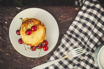 cheese cakes with berries  cottage cheese sour cherry. food background