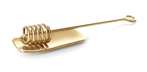 Golden honey dipper on white background