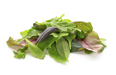 Variety of fresh salad leaves on white background