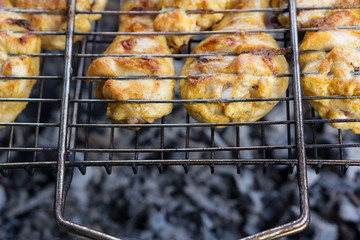 Chicken legs on the grill