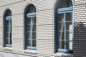 Brick House Windows with rolling shutter