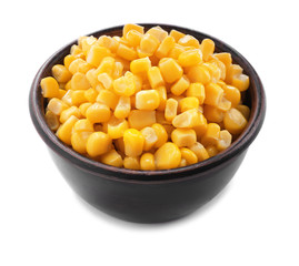Bowl with boiled corn seeds on white background
