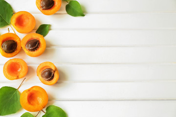 Fresh apricots on wooden table