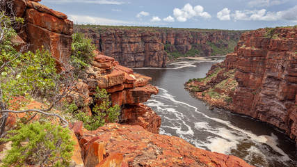 Landscape view looking into the gorge and tidal inlet below the twin falls on the King George...