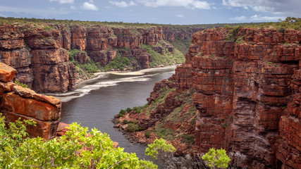 Landscape view looking into the gorge and tidal inlet below the twin falls on the King George River, Kimberley, Australia - obrazy, fototapety, plakaty