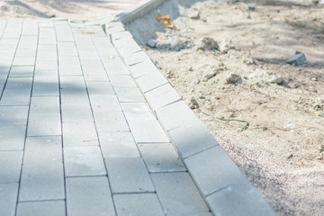Fototapeta premium Laying of paving slabs.