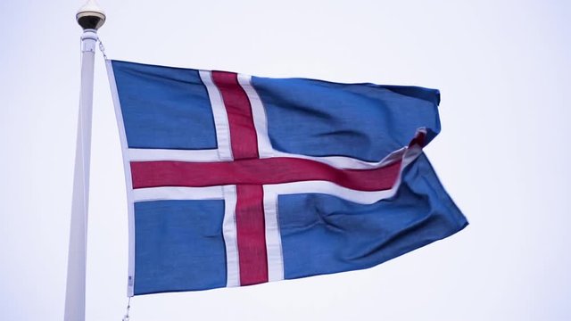 The Icelandic flag flapping in the wind. Slow Motion Footage.