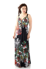 young beautiful woman in sundress with colorful flower pattern