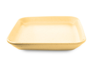 Yellow brown square plate isolated on white background.