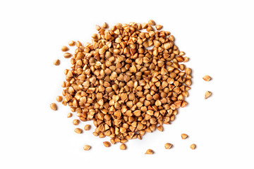 Macro top view image of buckwheat pile isolated at white background.