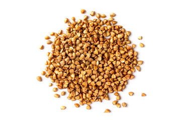 Macro top view image of buckwheat pile isolated at white background.