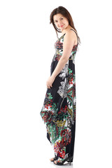 young beautiful woman in sundress with colorful flower pattern