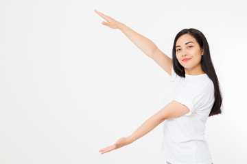 Japanese girl showing copy space by hands. Young asian woman isolated on white background. Advertising hand concept. Korean beauty