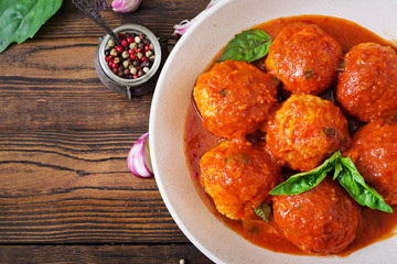 Meatballs in tomato sauce and toast with basil pesto. Dinner. Tasty food. Top view. Flat lay