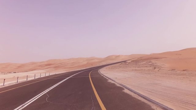 New road from Oasis Liwa to Moreeb Dune in Rub al Khali desert stock footage video