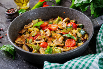 Hot spicy stew eggplant, sweet pepper, tomato, zucchini and mushrooms.