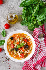 Minestrone, italian vegetable soup with pasta. Vegan food. Top view. Flat lay.