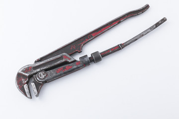 Used Pipe Wrench on a White Background