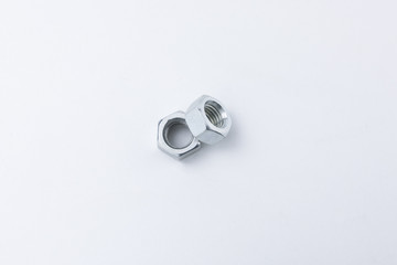 Pair of Steel Nuts Isolated on a White Background