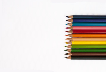 colored pencils on white background