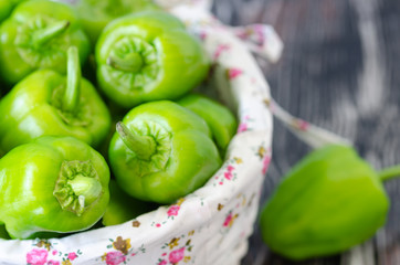 Raw and Fresh Green Organic Bell Peppers İn the Basket.