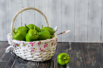 Raw and Fresh Green Organic Bell Peppers İn the Basket.