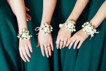 Wedding flowers in hand the bride and her bridesmaids.