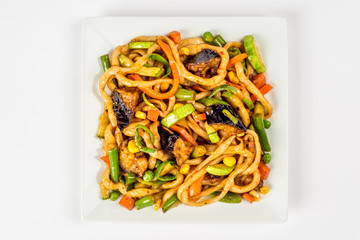 Fried noodles on a white plate