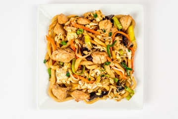 Fried noodles on a white plate