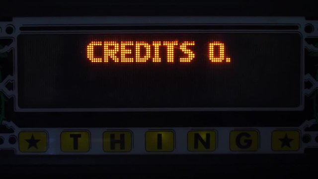 Pinball machine screen with insert coin and no credits message flashing