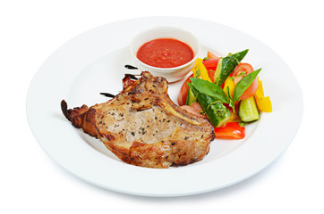 Tasty grilled ribs with vegetables