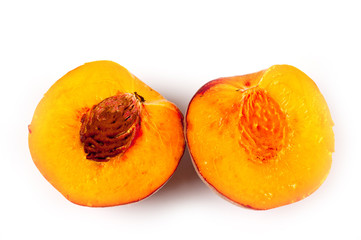 Peach juicy bright and beautiful shot close-up on a white background