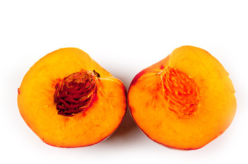 Peach juicy bright and beautiful shot close-up on a white background