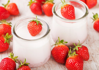 Fresh cream dessert with raw organic strawberry