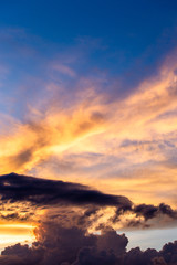 colorful dramatic sky with cloud at sunset.