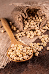 Soybean oil on a wooden background. rustic style