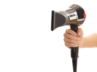 Hand of woman holding a black hairdryer isolated over white background. Free from copy space.