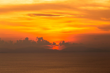 colorful dramatic sky with cloud at sunset.