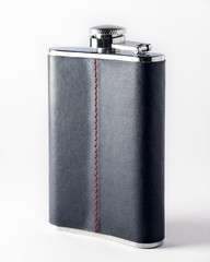 Black leather lined Hip flask on white background