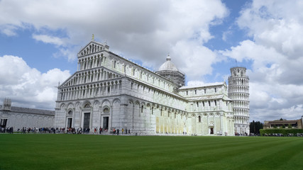 Fototapeta na wymiar Roman Catholic Cathedral with leaning Tower of Pisa, summer tourism in Italy