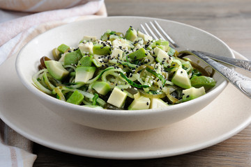 Salad from noodles from cucumbers and    laminaria