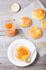 Cottage cheese pancakes baked in the oven. Russian dessert  syrniki with jam. 