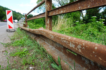 Damaged road barrier