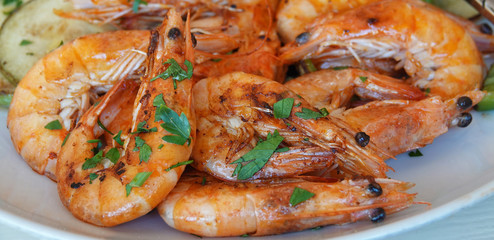 Shrimps meal with herbs prepared dish