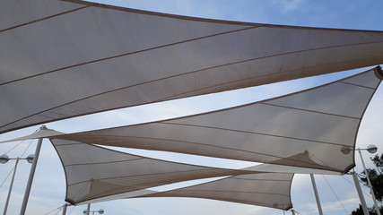 Fabrics to cover the sun and make shadows, with triangular shapes